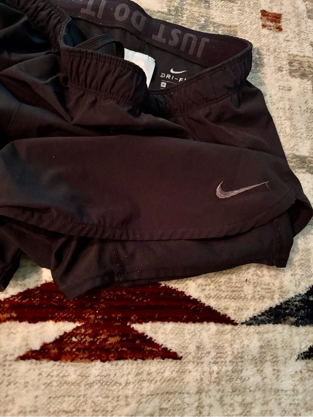 Nike Women's Dark Gray Athletic Running Shorts with Reflective Swoosh